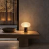 Auren Table Lamp Modern Console Table Auren sculptural table lamp with dark patterned base on a wooden console table