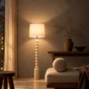 Bianca decorative white floor lamp with stacked rounded base and fabric-style cylindrical shade in a modern interior