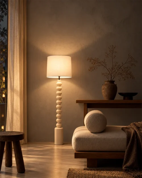 Bianca decorative white floor lamp with stacked rounded base and fabric-style cylindrical shade in a modern interior