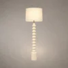 Bianca white floor lamp with stacked rounded column detailing and cylindrical lampshade