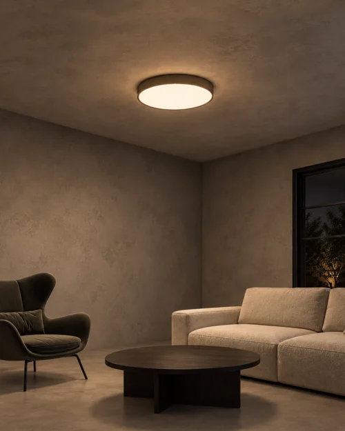 Carrie circular ceiling light displayed in a contemporary seating area
