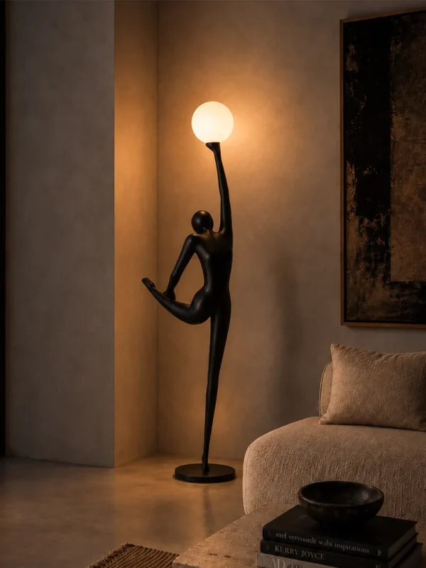 Civil Reaching sculptural floor lamp with glowing spherical light beside a sofa in a modern living room