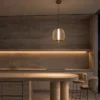 Clymene Pendant Light above a table in a contemporary kitchen interior