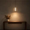 Clymene Pendant Light displayed above a console in a modern interior