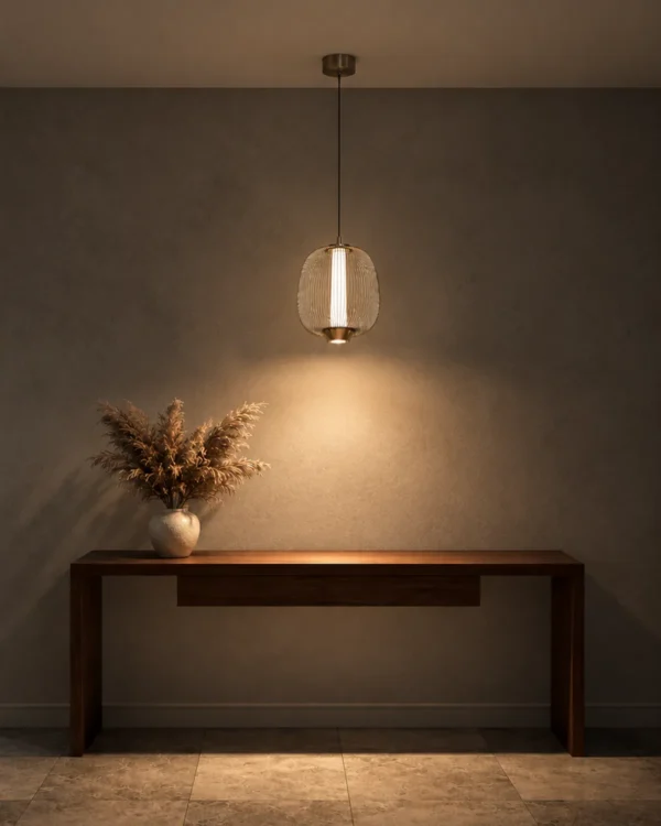 Clymene Pendant Light displayed above a console in a modern interior