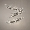 Doncella Sculptural Chandelier Doncella chandelier with Matte White ceramic petals and flowing metallic branches
