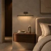 Elanor linear wall lamp beside a bed in a contemporary bedroom