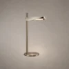 Elian Modern Minimalist Table Lamp Elian table lamp with a slim vertical stem, horizontal light bar, and circular base