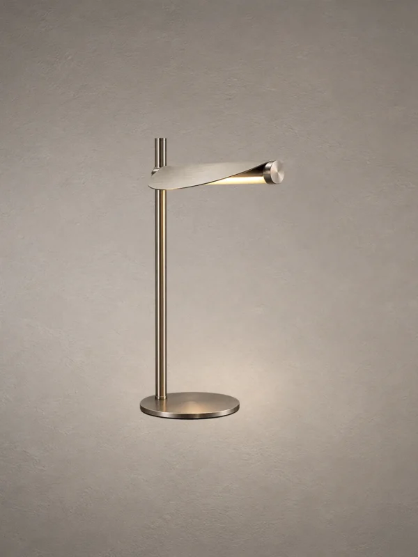 Elian table lamp with a slim vertical stem, horizontal light bar, and circular base