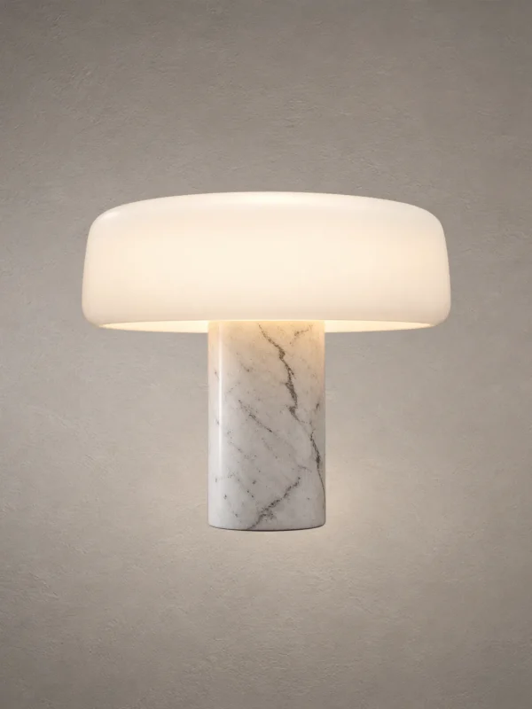 Elvéra table lamp featuring a rounded white shade and marble-inspired cylindrical base