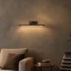 Kamari wall lamp illuminating a contemporary interior