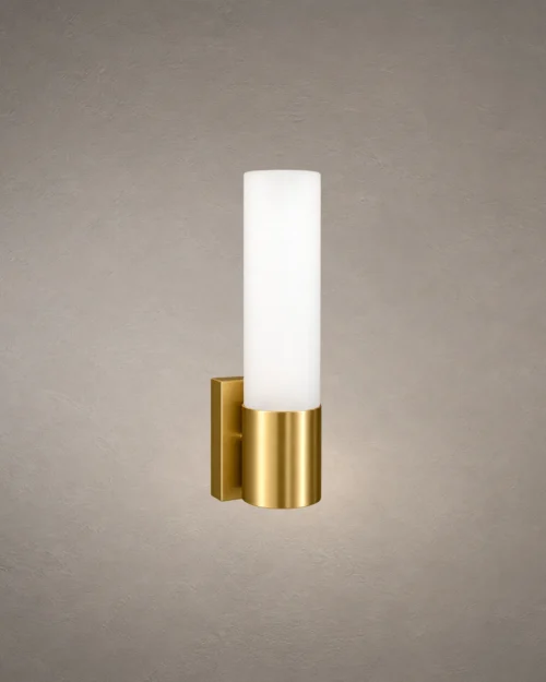 Kianna modern gold wall lamp featuring a cylindrical white glass shade and metallic base
