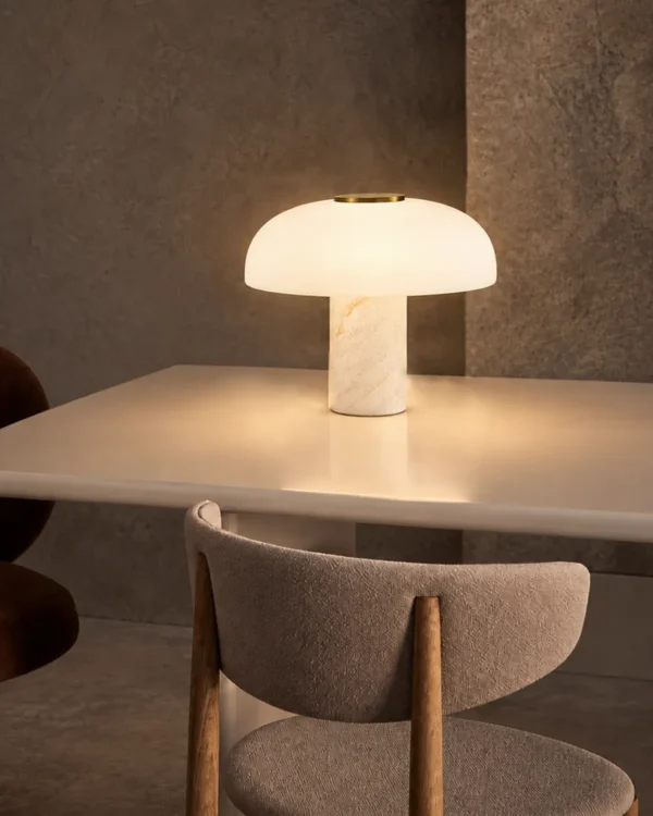 Kiel table lamp displayed on a dining table in a contemporary interior