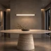 Kori 80 chandelier in Bronze Gold above a modern dining table