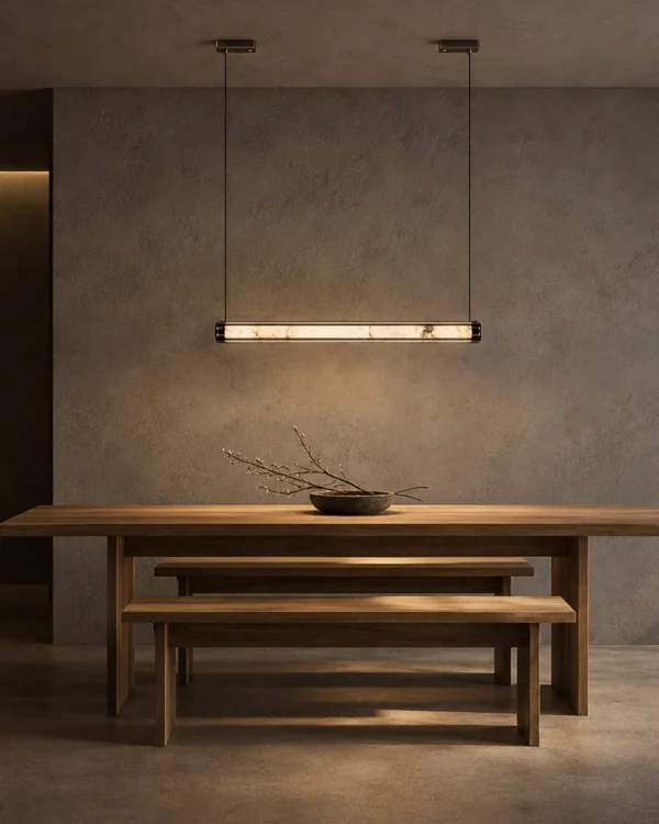 Kori 80 chandelier in Gun Black above a contemporary dining table