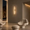 Leti vertical wall lamp illuminating a modern interior