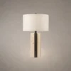 Lithos Modern Table Lamp Lithos table lamp with cylindrical white fabric shade and textured stone-inspired base