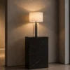 Lithos Table Lamp Modern Interior Lithos table lamp displayed on a black stone pedestal in a contemporary interior