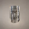 Martina modern chrome wall lamp featuring layered vertical stainless-steel panels