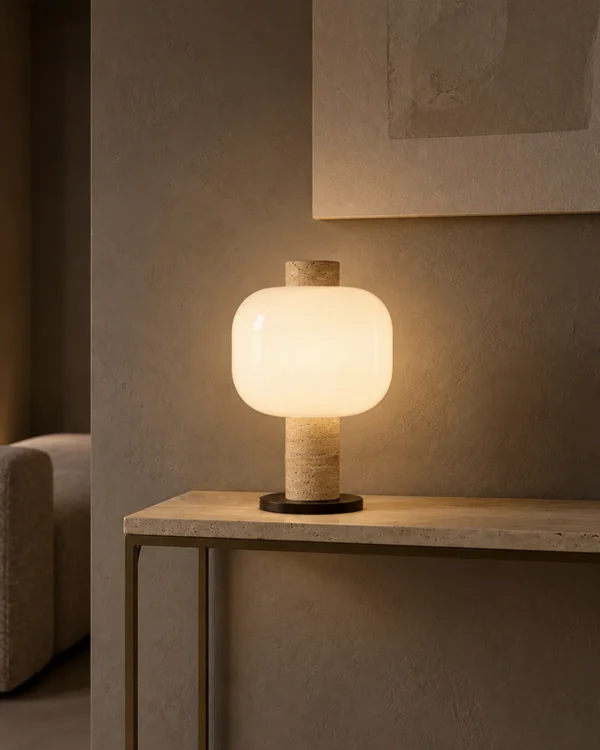 Milky Shine table lamp displayed on a console in a modern interior