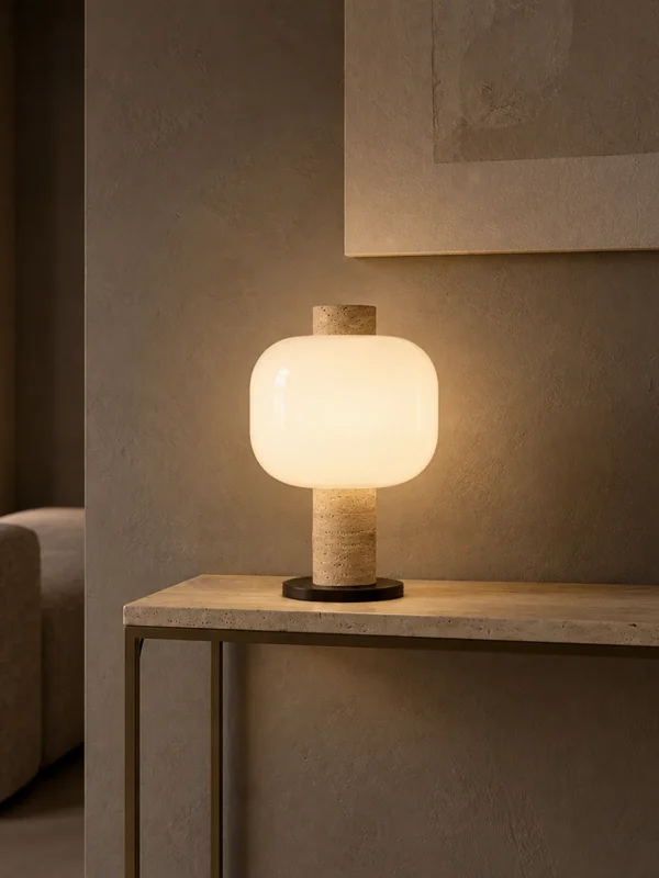 Milky Shine table lamp displayed on a console in a modern interior
