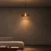 Monica Pendant Light Contemporary Living Room Monica dome-shaped glass pendant light providing warm illumination in a minimalist contemporary living room