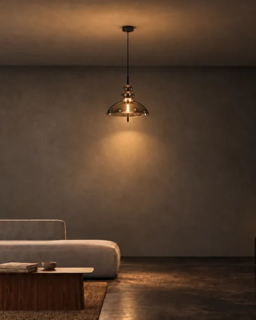 Monica Pendant Light Contemporary Living Room Monica dome-shaped glass pendant light providing warm illumination in a minimalist contemporary living room