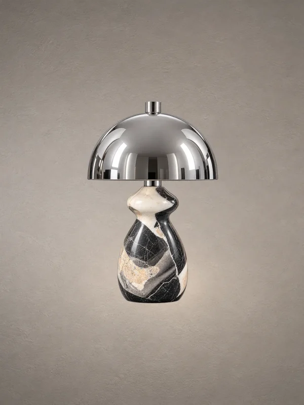 Nero table lamp with polished silver dome shade and sculptural black marble-patterned base