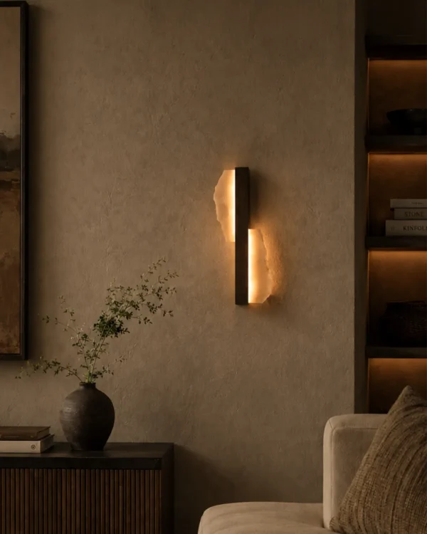 Offset Plate wall lamp illuminating a contemporary living room