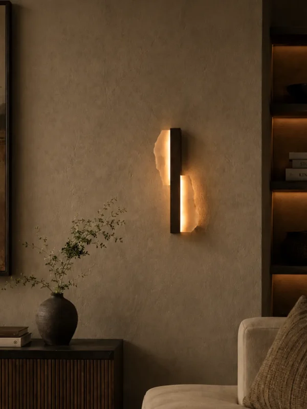 Offset Plate wall lamp illuminating a contemporary living room