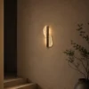 Offset Plate sculptural wall lamp in a modern interior