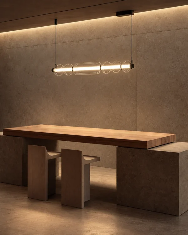 Orbis Horizontal Pendant Light above a contemporary dining table