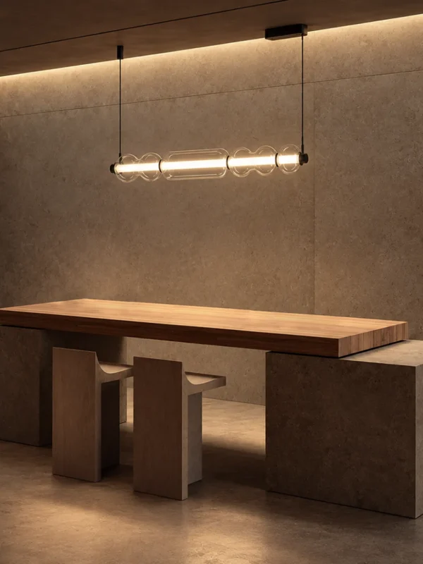 Orbis Horizontal Pendant Light above a contemporary dining table