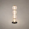 Orbis sculptural table lamp in Matte Brass and Cognac finish