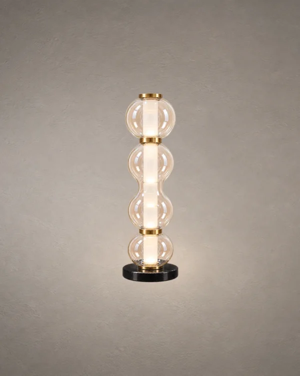 Orbis sculptural table lamp in Matte Brass and Cognac finish