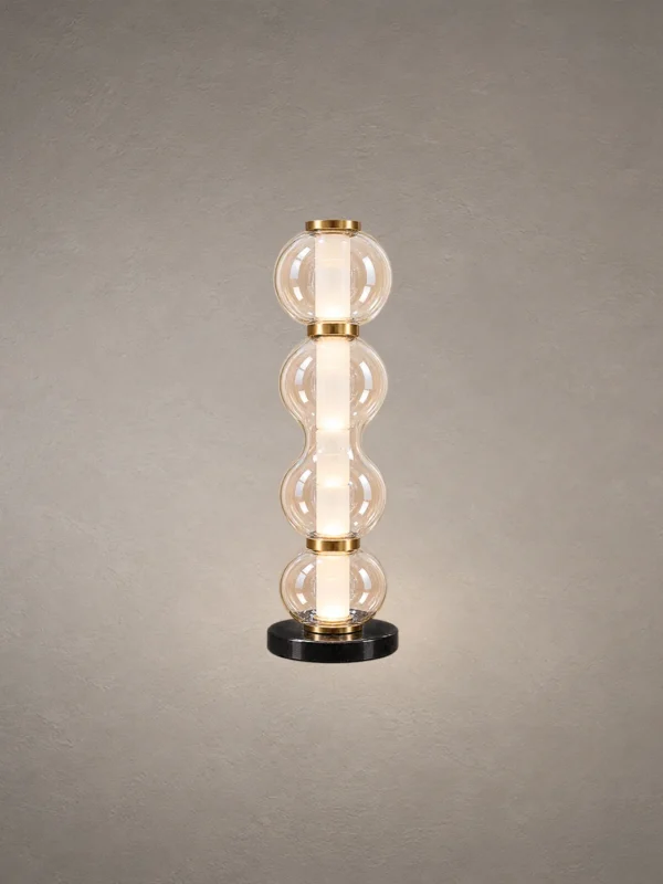 Orbis sculptural table lamp in Matte Brass and Cognac finish