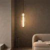 Orbis Vertical Pendant Light in a contemporary living room
