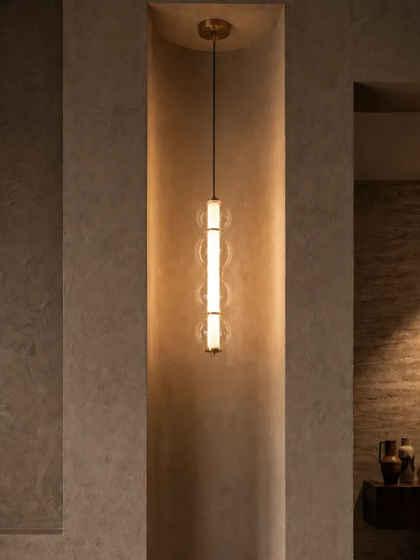 Orbis Vertical Pendant Light in Matte Brass and Cognac