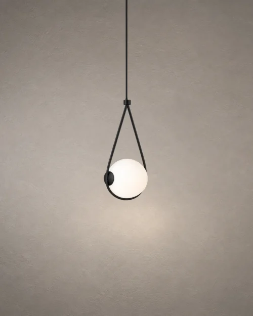 Orbit black and white pendant light with an illuminated spherical globe suspended within a triangular frame