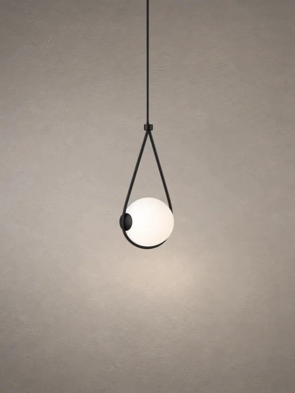 Orbit black and white pendant light with an illuminated spherical globe suspended within a triangular frame
