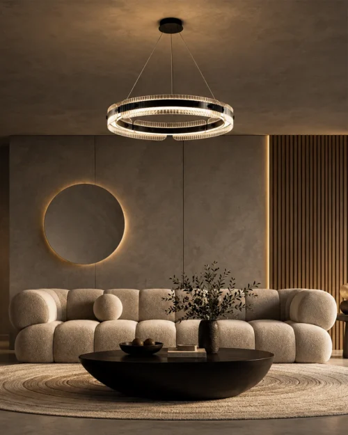 Oriel Chandelier Contemporary Living Room Oriel illuminated ring chandelier above a modern living room seating area with a curved sofa