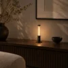 Oryn contemporary table lamp displayed in a modern bedroom interior
