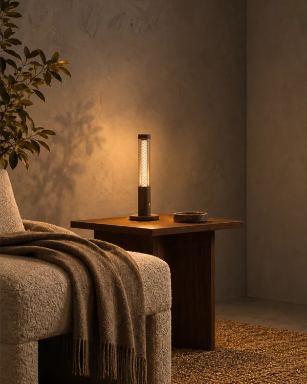 Oryn contemporary table lamp beside a bed in a modern interior