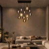 Osiris Rectangular Chandelier Living Room Osiris 13-light rectangular chandelier with colorful glass pendants above a contemporary living room