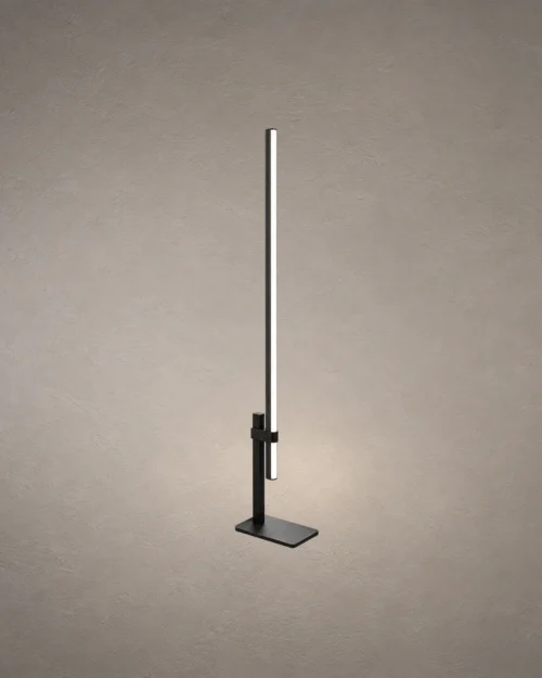 Perun floor lamp featuring a slender vertical illuminated bar and rectangular black base