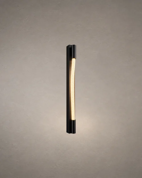Razel modern gun black wall lamp featuring a gently curved illuminated strip