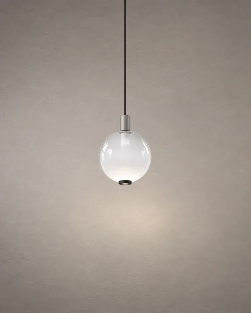 Ronde modern spherical pendant light featuring a gradient white glass globe and metallic stem