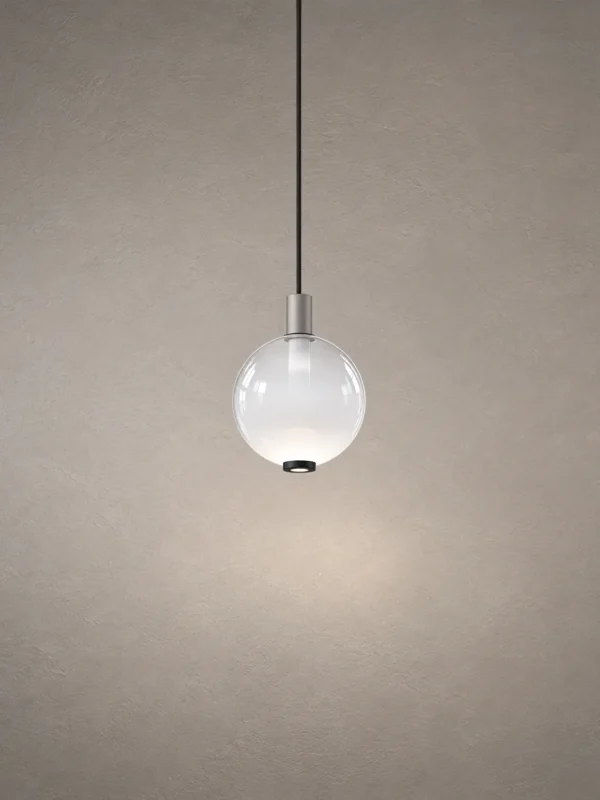 Ronde modern spherical pendant light featuring a gradient white glass globe and metallic stem