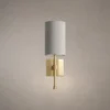 Serafina modern wall lamp featuring a cylindrical grey fabric shade and elegant gold metal base