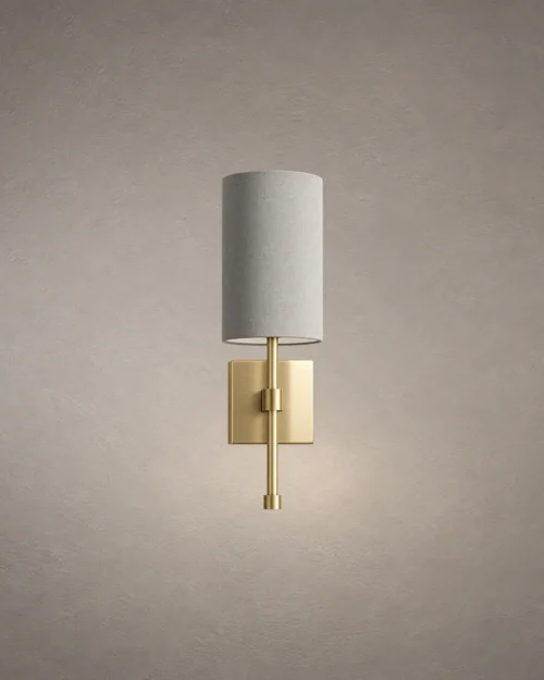 Serafina modern wall lamp featuring a cylindrical grey fabric shade and elegant gold metal base
